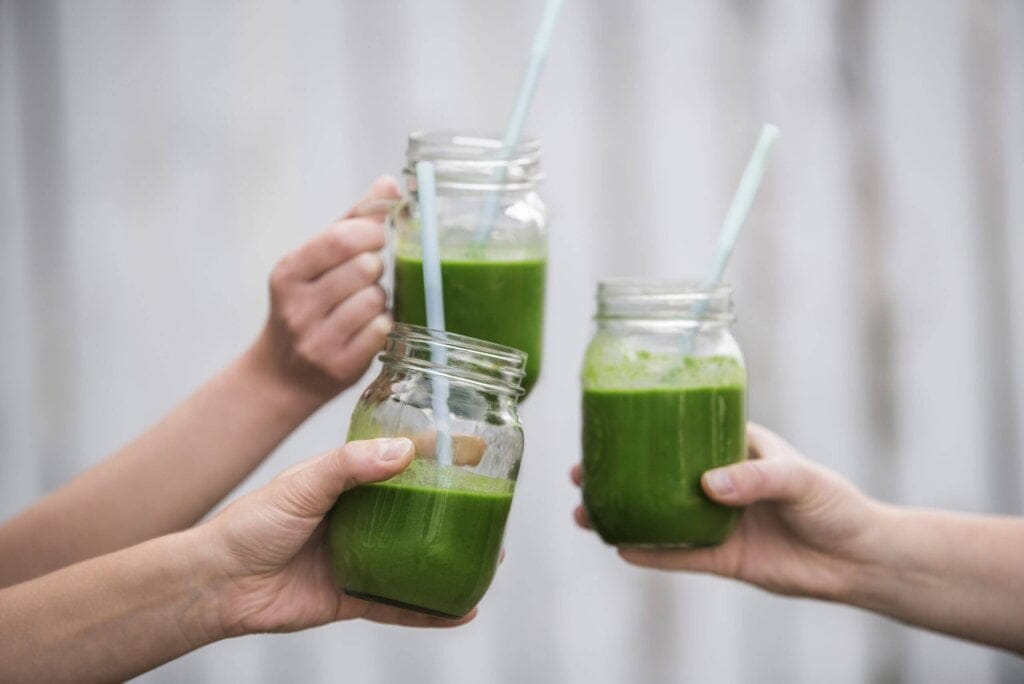 closeup-shot-tasty-green-vegan-fresh-smoothie-edited-color-scaled